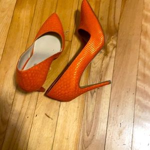 Orange pointy heels